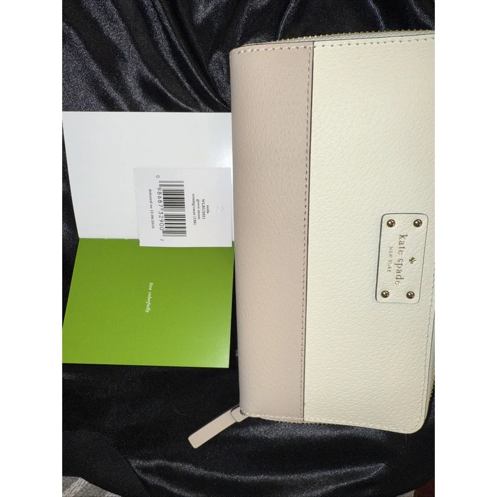 KATE SPADE large zip around white and tan wallet brand new